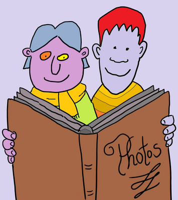 Foster Carers looking at photo book